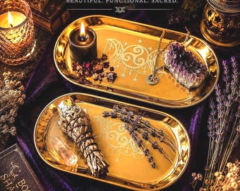 May include: Two gold-coloured trays with ritual items, including candles, crystals, and sage bundles. The trays are decorated with a celestial design. Text reads "MADE FOR RITUAL. Used with Intention."