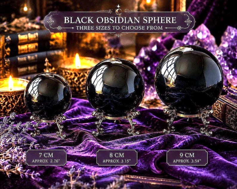 May include: Three polished black obsidian spheres displayed on ornate silver-toned metal stands. The spheres are labelled with sizes of 7 cm (2.76 inches), 8 cm (3.15 inches), and 9 cm (3.54 inches). The text reads Black Obsidian Sphere.