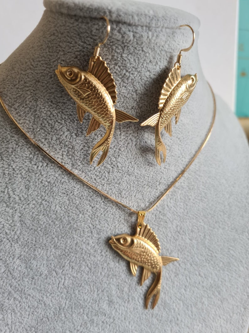 set necklace and earrings of golden fish charms