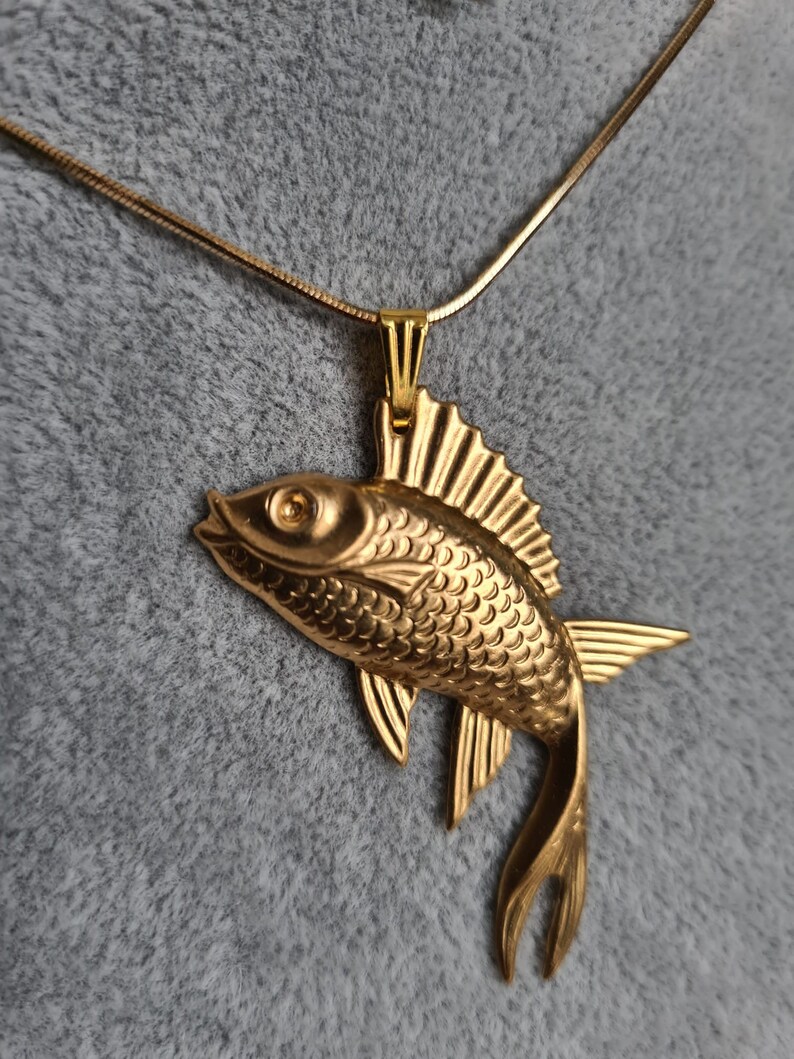 set necklace and earrings of golden fish charms