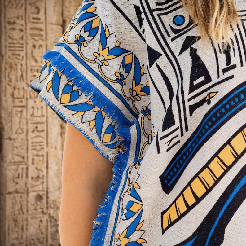Casual styled image of embroidered Egyptian abaya with V-neck and clean relaxed silhouette