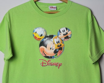 Camiseta gráfica vintage Disney Shopping Mickey Mouse Pato Donald Pateta e Plutão