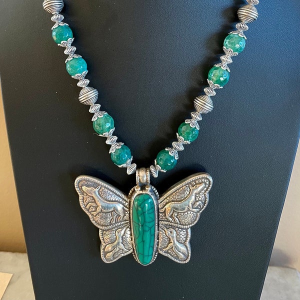 Vintage Silver Tibetan repousse Butterfly, inlaid with turquoise. Strung with green agate and silver beads. Free matching earrings
