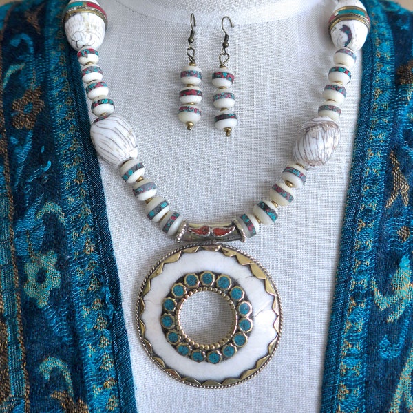 Statement necklace. Nepalese Naga shell donut pendant with matching Naga shell beads. Matching earrings