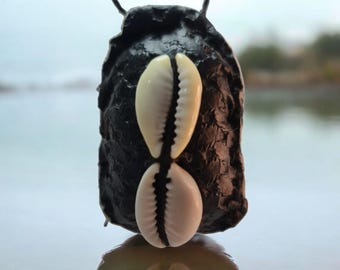African amulet to attract money. Black - African art amulets - Secrets of Fon voodoo, Benin - religious art