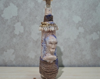 Magic Bottle to strengthen the spirit, prepared by a Warrior of traditional African medicine.