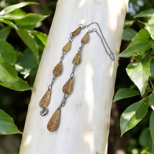 Ekuele Bone drop ekwele opele of Orula Orunmila Ifá Santeria, Pocket Ekule