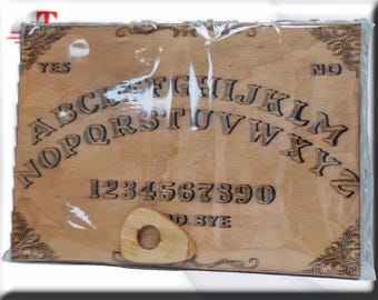 May include: A wooden Ouija board with a planchette. The board has the letters of the alphabet, numbers 1-9 and 0, and the words "yes", "no", and "goodbye".