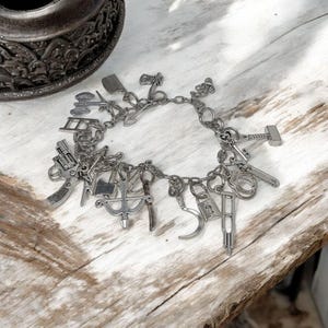 Achabá-armband met de 21 stukken van Oggun Ifá Santeria Palo Mayombe