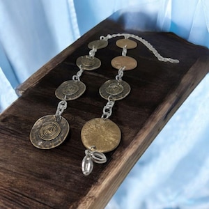 Ekuele metal bronze ekwele opele of Orula Orunmila Ifá Santeria divination oracle Ifá