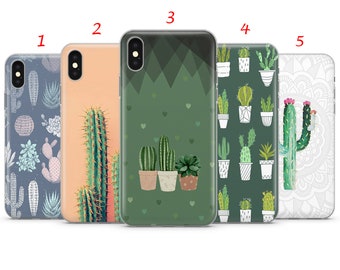 May include: Five different phone cases with cactus designs. The cases are clear and show the phone's color underneath. The designs include a single cactus, a cactus with hearts, a cactus with mountains, a cactus pattern, and a mandala pattern.