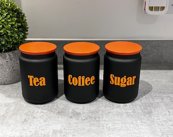 Black Tea Coffee Sugar Kitchen Storage Canister Sets shown with Orange Lids And Wording Of Your Choice