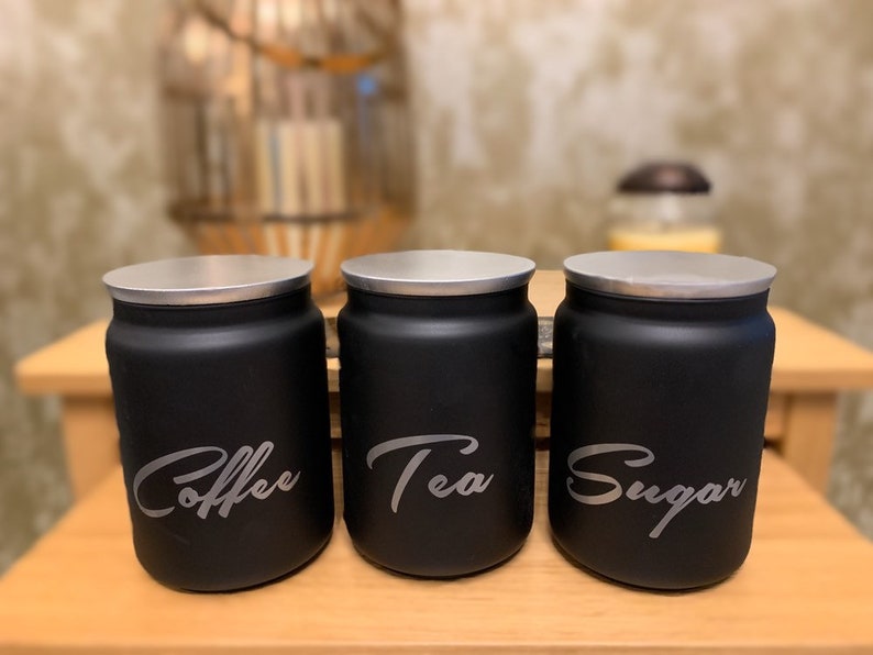 black and silver tea coffee sugar