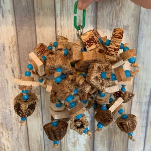 Chewing Mahogany and balsa slat toy