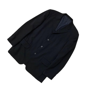 May include: A black blazer with a classic three-button closure and two front pockets. The jacket has a notched lapel and a dark blue lining. The garment is made of a smooth, solid fabric and is suitable for formal or business attire.