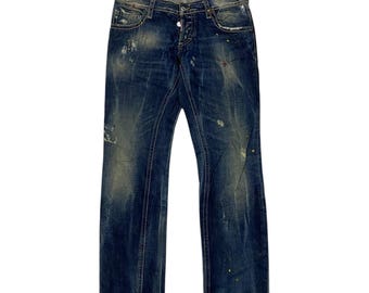 Disquared2 jeans desgastados con salpicaduras de pintura, bonito diseño