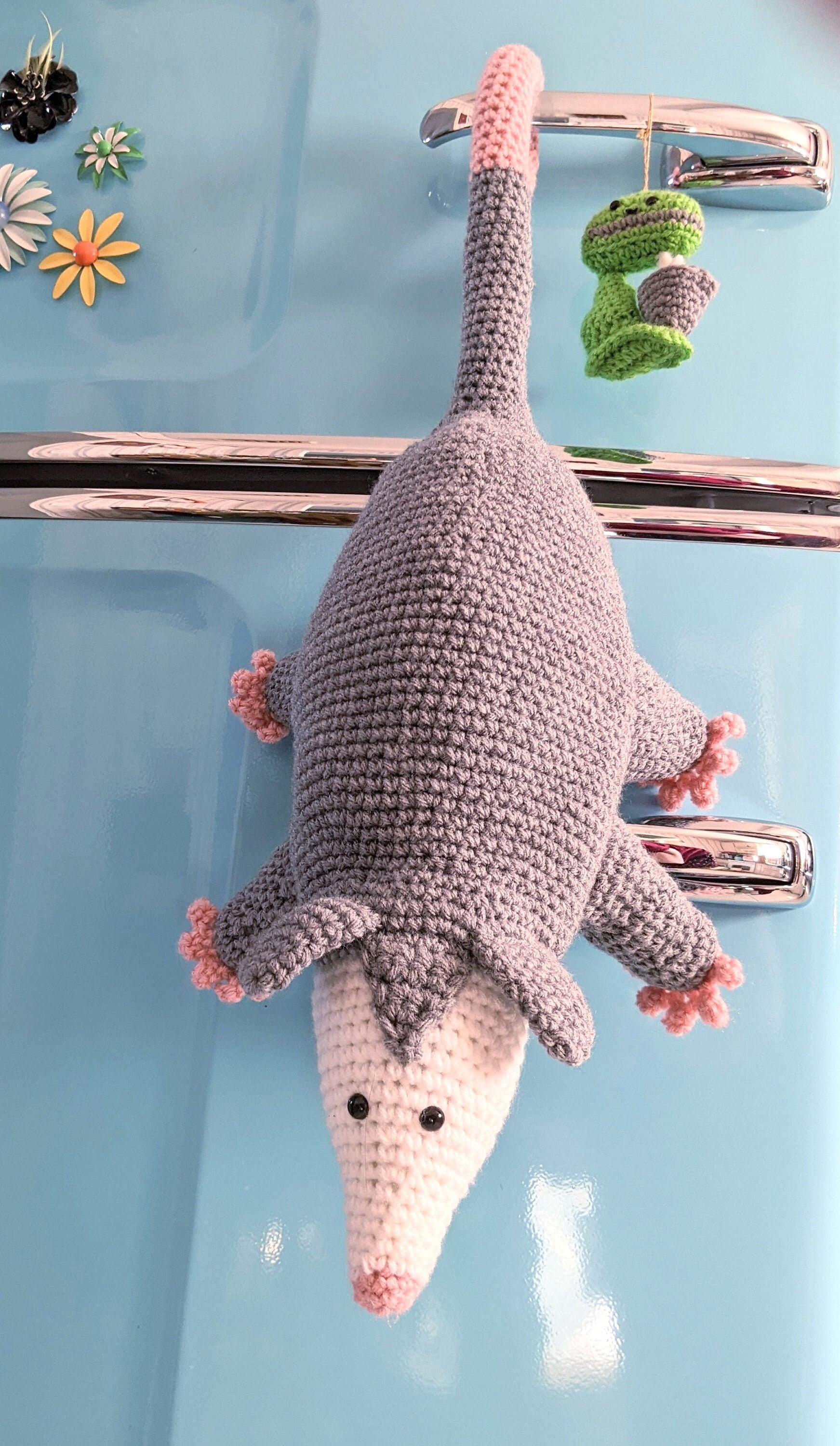 12 Grocery Bag Holder Crochet Patterns to Keep Kitchen Storage Neat and Handy 10 Opossum Plastic Bag Holder Crochet Pattern