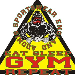 May include: A yellow triangle with a black border and the words "Sportswear England" in green and red. Inside the triangle is a black silhouette of a muscular gorilla with red lips and a red tongue. The words "Eat Sleep Gym Repeat" are in red and green on the bottom of the triangle.