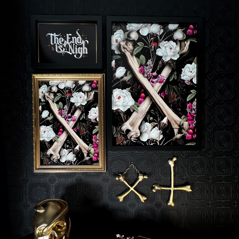 May include: A black framed print with a floral design featuring white flowers and two crossed bones. The print has the text "The End is Nigh" in a black frame above it.