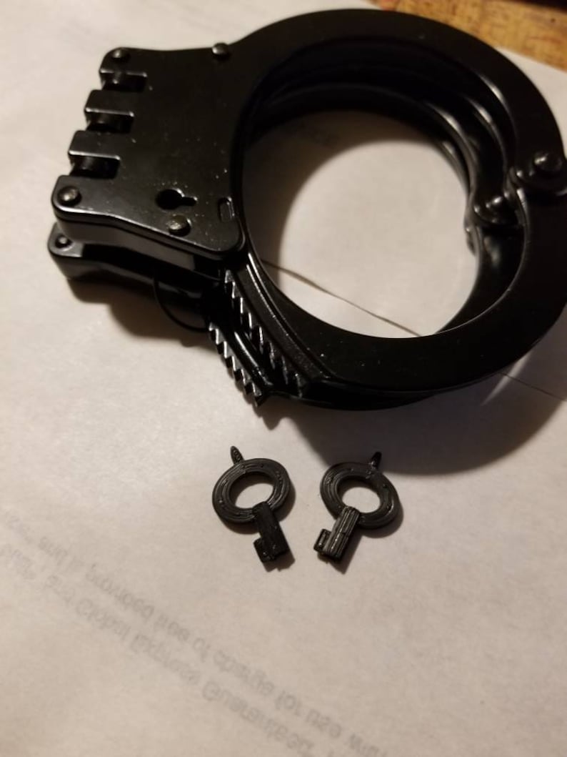 x2 Universal Police Tactical Clear Non Metallic Covert Police Handcuff Cuff Key