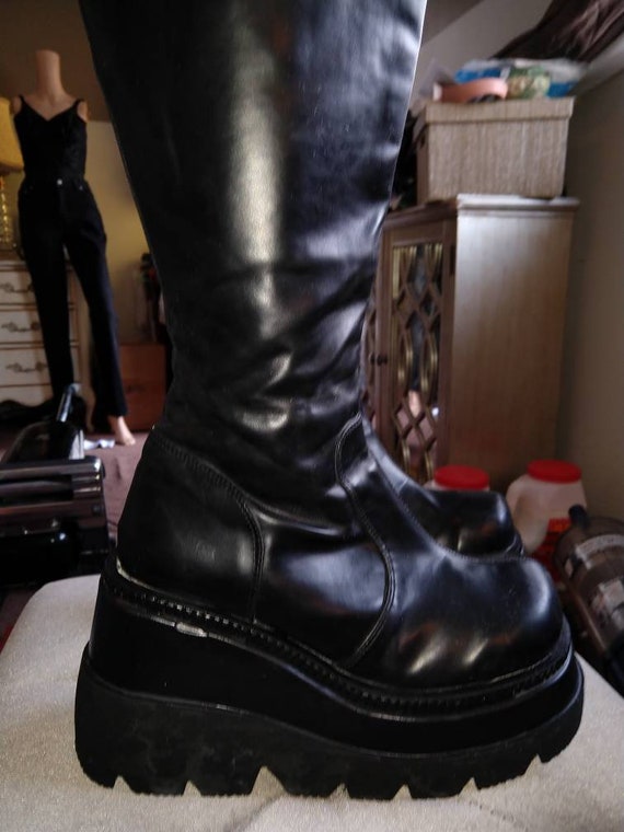very tall platform boots