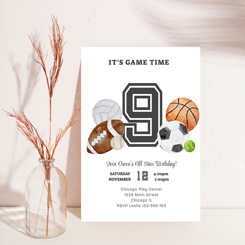 May include: A white invitation with black text for a 9th birthday party. The invitation features a large black number 9 with a white outline and a variety of sports balls including a basketball, soccer ball, baseball, football, and volleyball. The text reads "It's Game Time" and "Join Owen's All Star Birthday!" with the date and time of the party. The location is listed as "Chicago Play Center, 1234 Main Street, Chicago IL". The RSVP information is "RSVP Leslie 133-555-153".