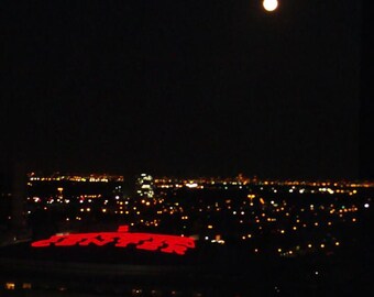 Moonrise over the Toyota Center in Downtown Houston