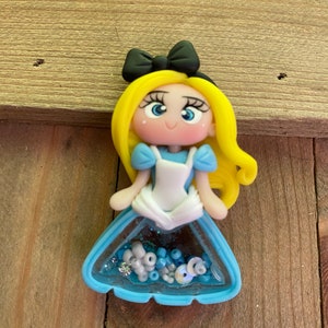 Alice Shaker Pin