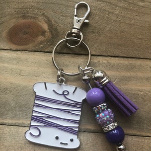 Purple Spool of Thread Keychain