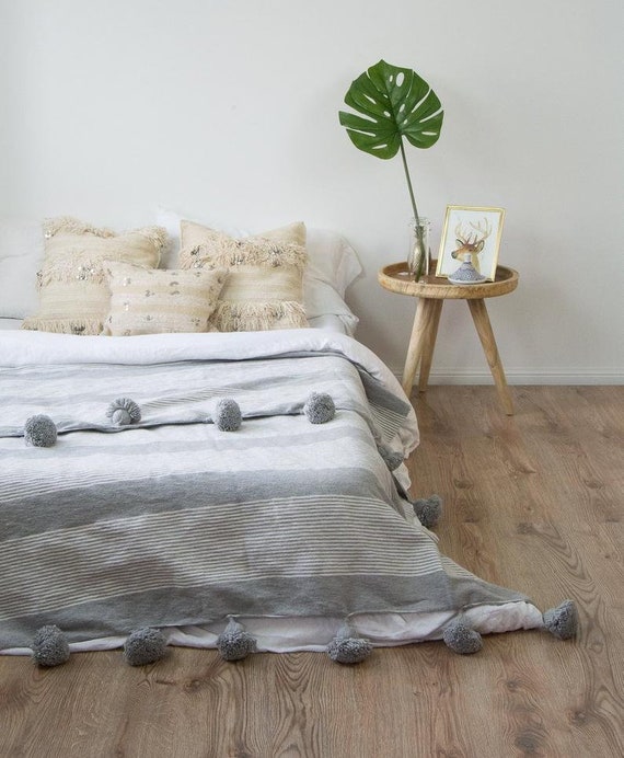 Grey throw blanket with pom poms sale