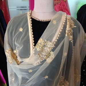 black dress with golden dupatta