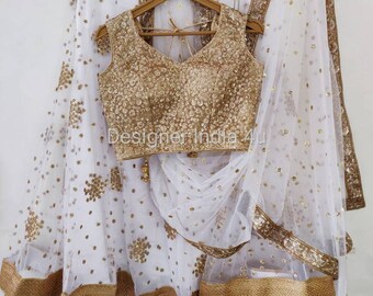 white and gold bridal lehenga