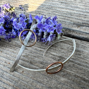 Faux Hoops crafted from hammered sterling silver e … a slice of silver ,  piercing a brass ring, you’ll feel like a warrioress in these.