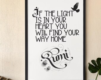 May include: Black and white framed print with a quote by Rumi: "If the light is in your heart you will find your way home".