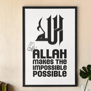 May include: Black and white framed print with the Arabic word for Allah in a stylized font. The text "Allah makes the impossible possible" is below the Arabic word.