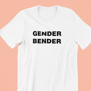 May include: White t-shirt with black text that reads "GENDER BENDER".