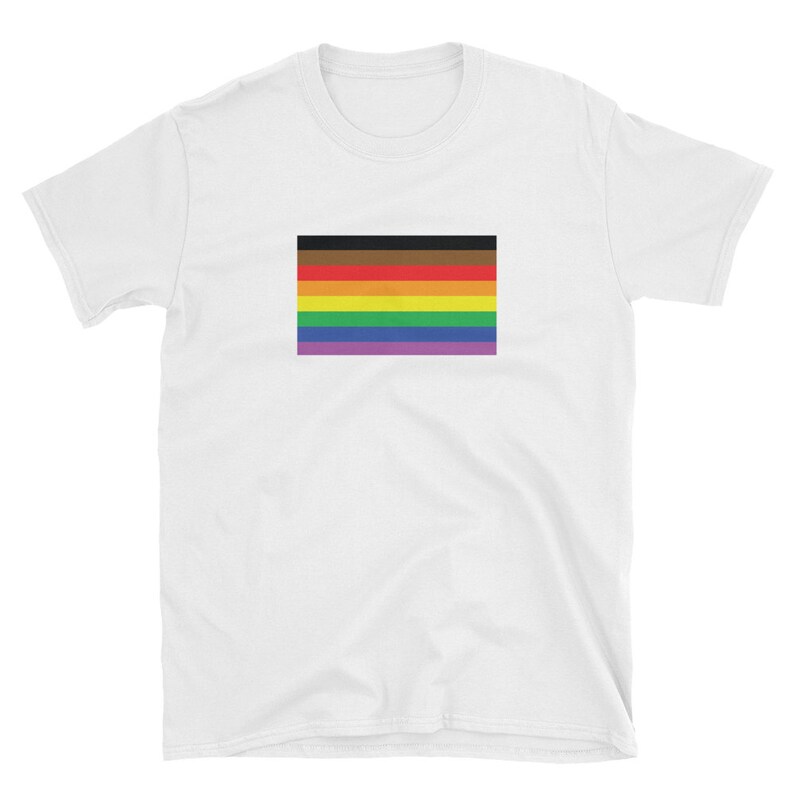 May include: White t-shirt with a multi-colored pride flag printed on the front. The flag has black, brown, orange, yellow, green, blue, and purple stripes.