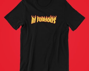 May include: Black t-shirt with a yellow and red "Bi Furious" graphic in a flame design.