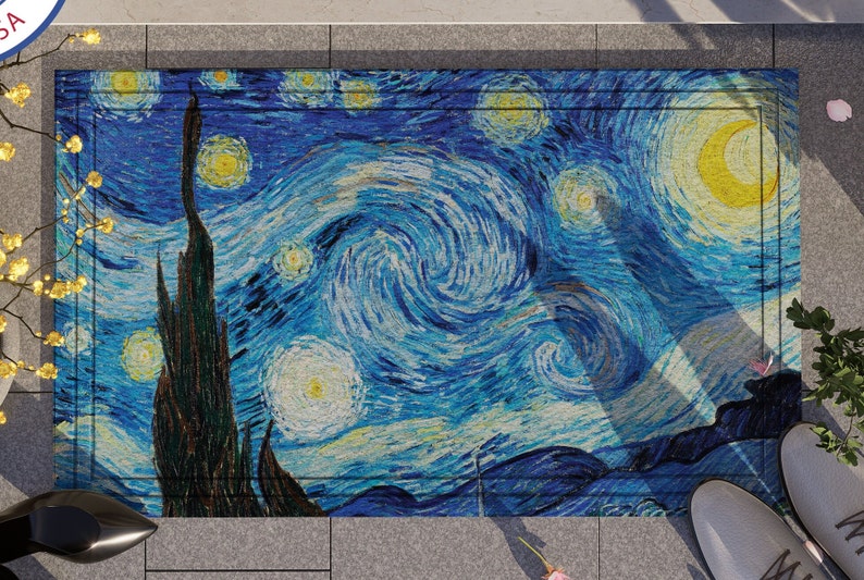 May include: A blue and yellow doormat with a swirling pattern reminiscent of Vincent van Gogh's "Starry Night" painting.