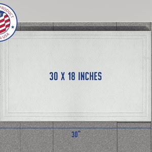 May include: A white rectangular tile with a raised border, measuring 30 inches by 18 inches. The tile is made in the USA.