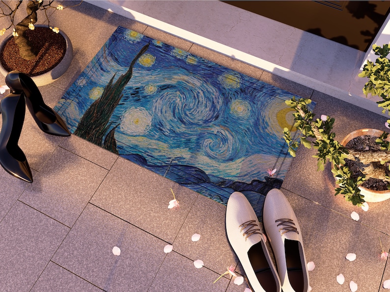 May include: A doormat with a blue and yellow painting of a starry night sky. The painting is reminiscent of Vincent van Gogh's famous artwork.