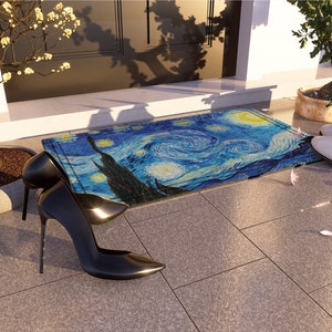 May include: A blue and yellow doormat with a swirling pattern reminiscent of Van Gogh's Starry Night. Two black high-heeled shoes are on the doormat, and a white shoe is on the floor.