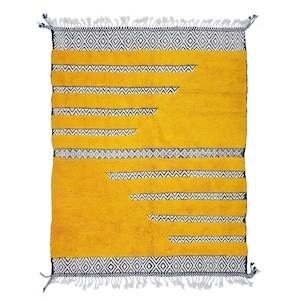 Mustard Wool Beniourain Rug
Tufted Custo made
Fringes on both ends
