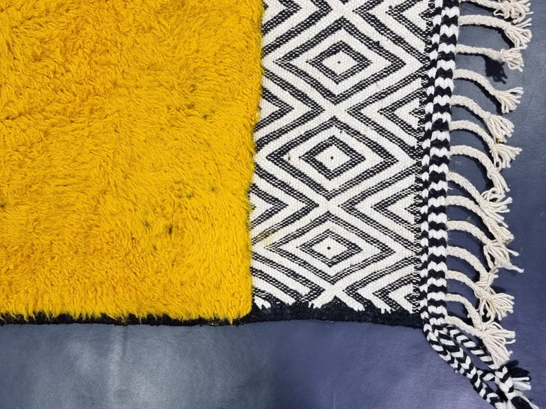Mustard Wool Beniourain Rug
Tufted Custo made
Fringes on both ends