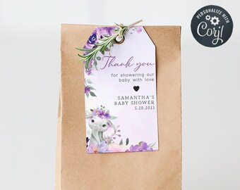 May include: A brown paper gift bag with a purple and white thank you tag. The tag features a watercolor illustration of a bunny with flowers and the text "Thank you for showering our baby with love Samantha's Baby Shower 5.10.2023".