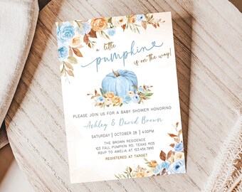 May include: Baby shower invitation with a watercolor design. The invitation features a light blue pumpkin and floral accents in blue, orange, and brown. Text includes the phrase "a little pumpkin is on the way!" and event details.