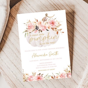 May include: Baby shower invitation with a white pumpkin design and floral accents. The text reads "a sweet little pumpkin is on the way!" and includes event details. The invitation is decorated with pink and peach roses.