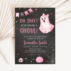 May include: A Halloween-themed baby shower invitation with a black chalkboard background. The invitation features pink text that reads "Oh Sheet We're Having a Ghoul!" and includes a pink ghost illustration. Additional details include the mom-to-be's name, date, time, and location.