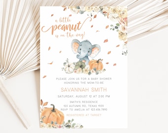 Puede incluir: Invitación a baby shower con el texto "a little peanut is on the way!" con una ilustración de acuarela de un elefante, calabazas y detalles florales. La invitación incluye detalles del evento e información RSVP.