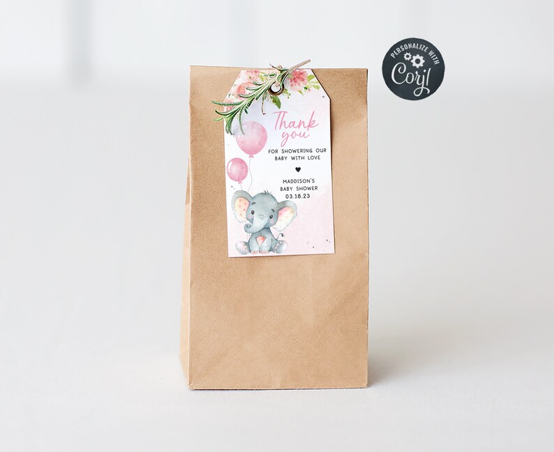 May include: Pink and gray thank you favor bag with a tag that says "Thank you for showering our baby with love" with an illustration of an elephant holding pink balloons. The tag also includes the text "Madison's Baby Shower 03.18.23".